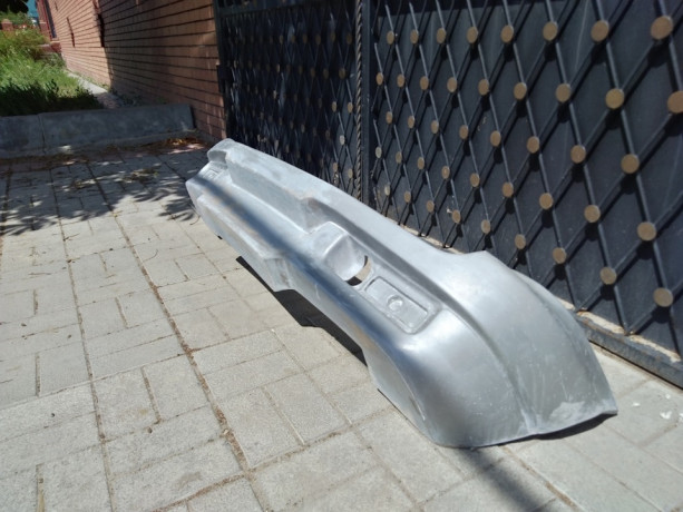 Силовой задний бампер стеклопластиковый для Chevrolet Niv@ купить недорого с доставкой в Ишим