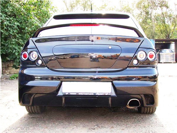 Бампер задний в стиле "EVO" для Mitsubishi Lancer IX (2003-2009) купить недорого с доставкой в Ишим
