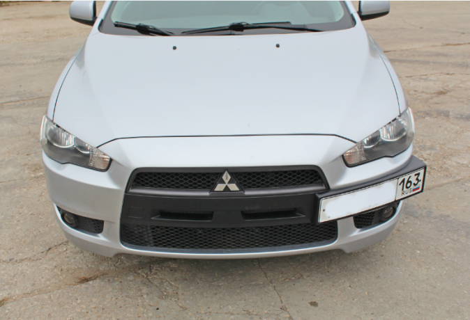 Рамка под номер на передний бампер для Mitsubishi Lancer X (2007-2016) купить недорого с доставкой в Ишим