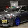 Спойлер переднего бампера (под клыки) для Mitsubishi Lancer X купить недорого с доставкой в Ишим